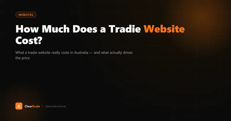 Tradie sitting at a workbench reviewing website pricing options on a laptop